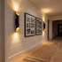 Solenne small black and gold wall sconce in a modern farmhouse hallway