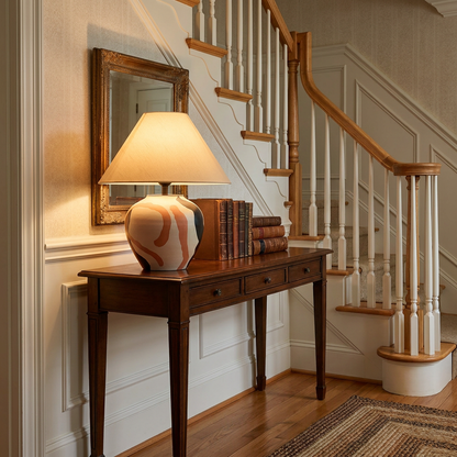 Siena table lamp on a console table in the entry of a colonial home