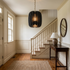 Lamelle oval graphite pendant light in the entry foyer of a colonial style home