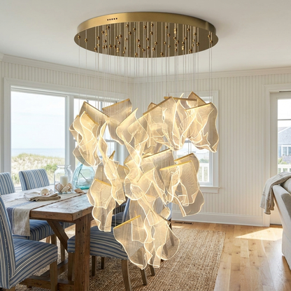 Cirrane 28 heads gold chandelier in the dining room of a Cape Cod beach house
