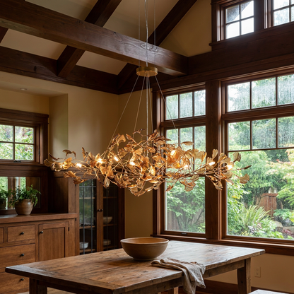 Ginevra coffee chandelier above a dining table in a Portland Oregon craftsman home with large windows