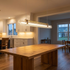 Talvi linear LED chandelier over the dining table in a suburban family home