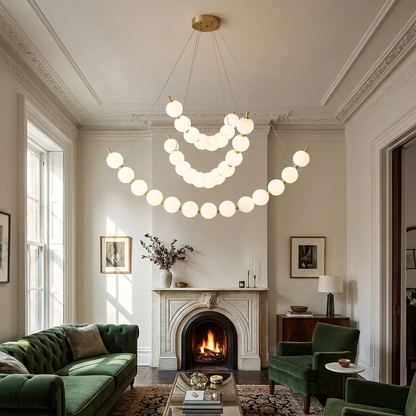 Coralyn stacked three ring LED chandelier in a Brooklyn brownstone parlor