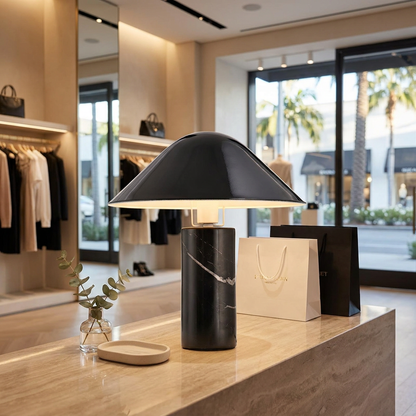 Pietra table lamp on a reception desk in a boutique