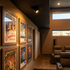 Cielo single head black adjustable recessed LED spotlight in a home theater ceiling
