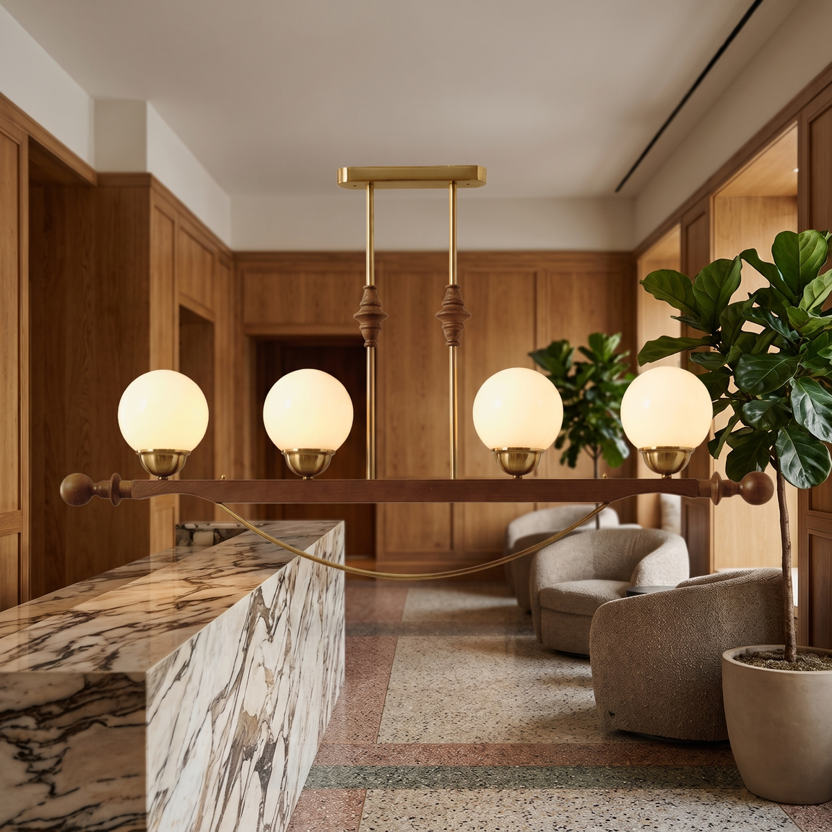 Verdane walnut and gold linear chandelier in a hotel lobby