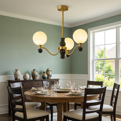 Ulyana brass and walnut glass globe chandelier, 3 lights, over a suburban dining table