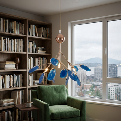 Calliste 4-head blue agate rose gold chandelier over a reading armchair in a Seattle apartment