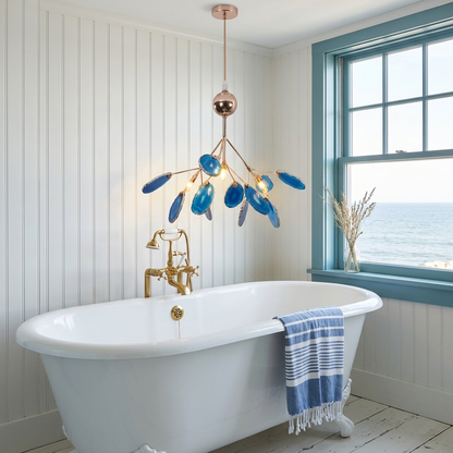 Calliste 4-head blue agate rose gold chandelier over a bathtub in a Cape Cod cottage bathroom