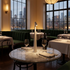 Amaryn cordless cone table lamp in White on a restaurant bistro table