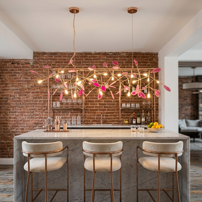 Calliste 24-head linear pink agate rose gold chandelier over a home bar in a Baltimore rowhouse