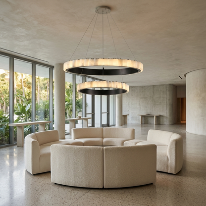Almira alabaster halo ring chandelier, two rings black, in a boutique hotel lobby in Miami, Florida