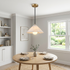 Zephyrine Alabaster Cone Brass Pendant Light Single over a dining table